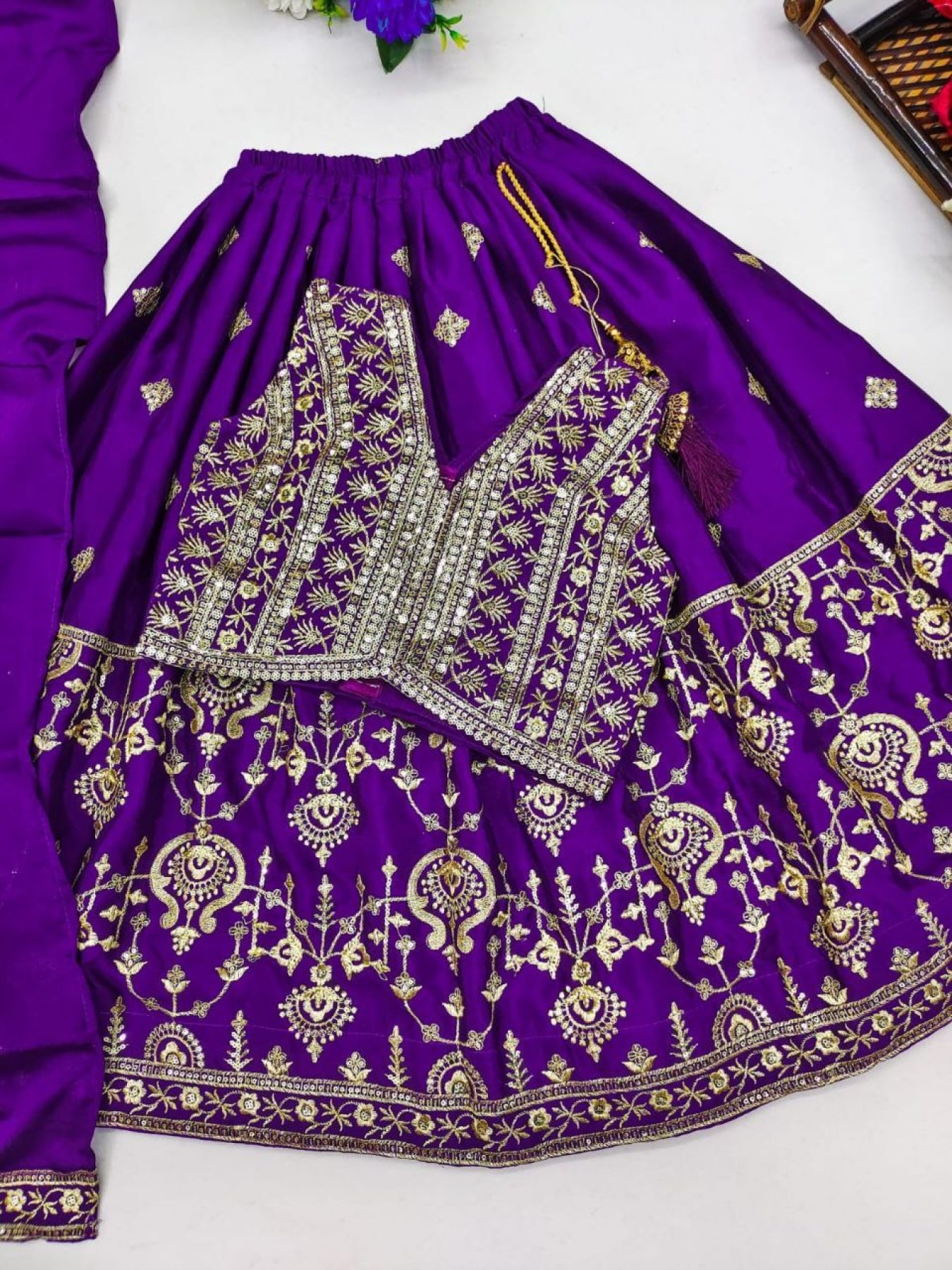 Beautiful Raw Silk Lehenga-Choli. Embellished with beautiful embroidery  work. Floral design with s… | Rajputi dress, Designer bridal lehenga,  Trendy blouse designs