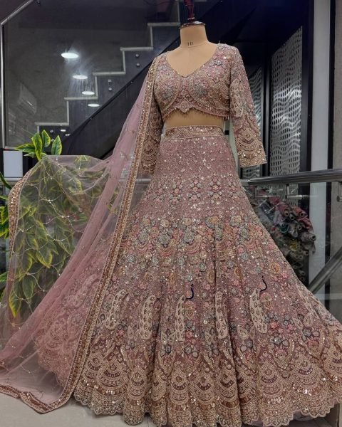 A New Color, A New Vibe! Flaunt this 4-meter flared sequins work lehenga and steal the spotlight. Designer Lehenga Choli