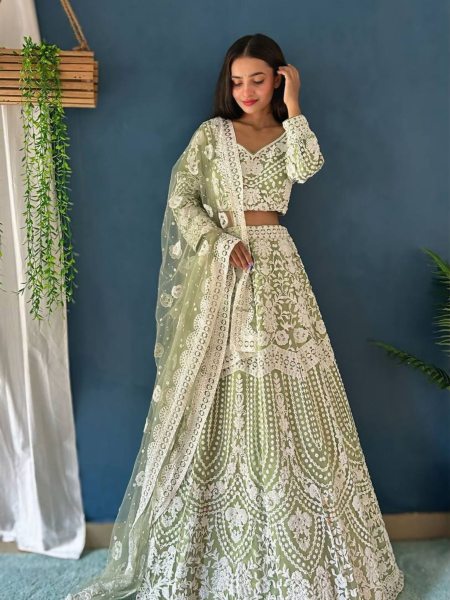 Exquisite Heavy Net Lehenga with Pearl Design Work  Lehenga