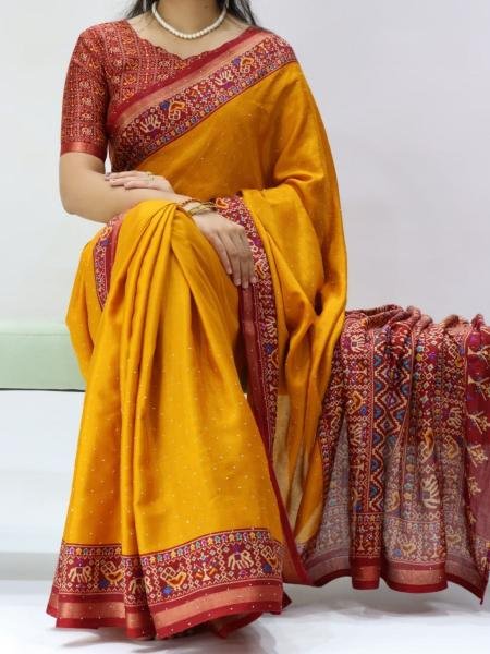 Impressive Yellow Mull Cotton Patola Print Saree with Sirovski Diamond And Zari Border  