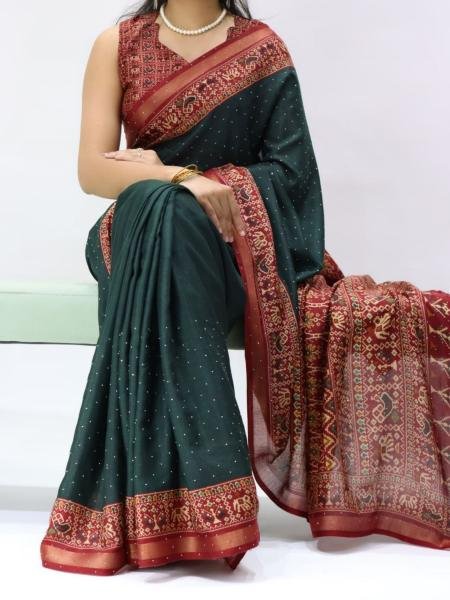 Delightful Bottle Green Mull Cotton Patola Print Saree with Sirovski Diamond And Zari Border  