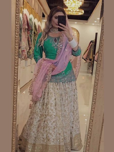 Punjabi Style Green Lehenga Choli with Mirror Work Perfect for Wedding Functions 